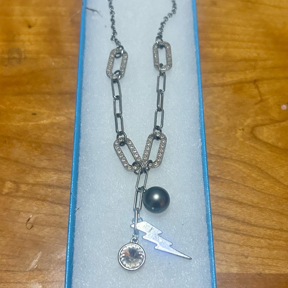 Swarovski’s Touchstone Charm Necklace